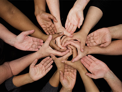 Equity diverse hands joined
